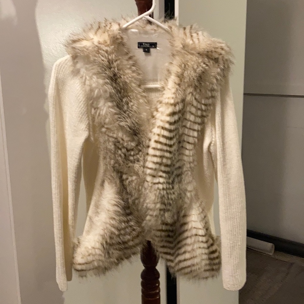 Faux Fur lined sweater .